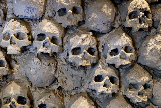 istock Wall of human skulls and bones 2163197897