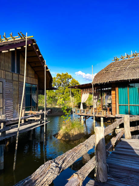 istock Traditional Courtyards with Stilt Houses and Water Reflections 2163198215