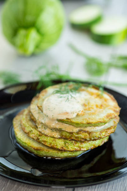 istock zucchini fried in batter with sauce 2163207448