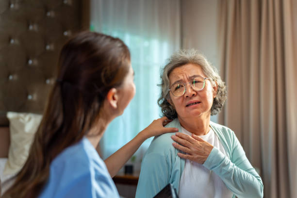 istock Doctor examine senior patient at home. 2163218598