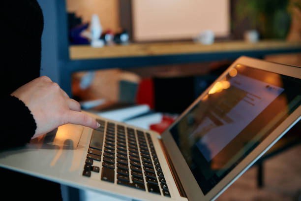 istock Close up of Hand Using Laptop in Office. 2163222480