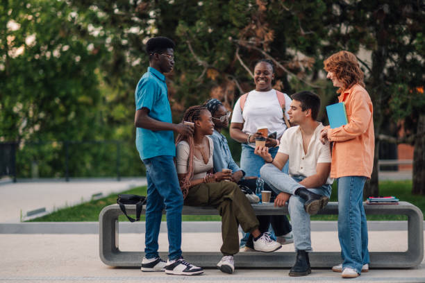 istock Full length of students on break talking and having coffee at campus. 2163226040