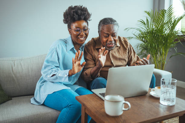 istock Engaged Black Father and Daughter Video Calling 2163227257