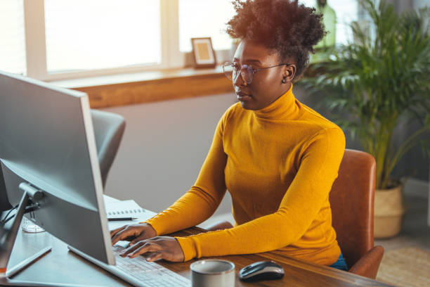 istock Professional Black Businesswoman Working in Home Office 2163227363
