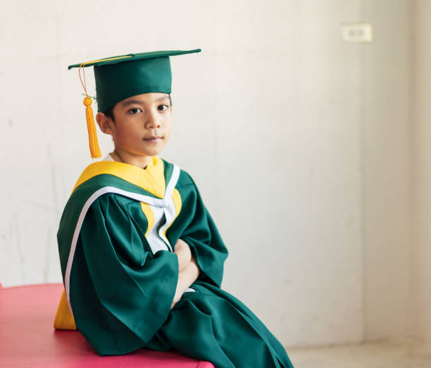 Childhood student with graduation gown