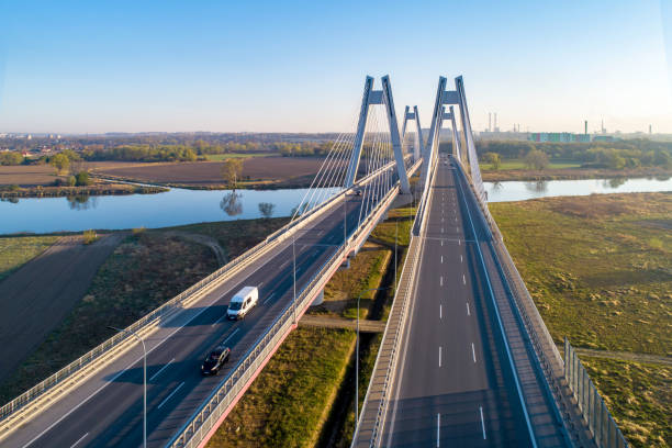 istock Double cable-stayed bridge in Krakow, Poland over the Vistula river at sunrise 2163230614