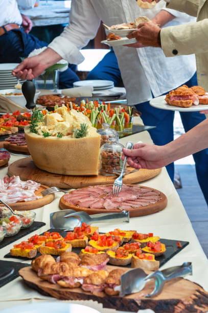 istock Guests are helping themselves at a catered event 2163239412