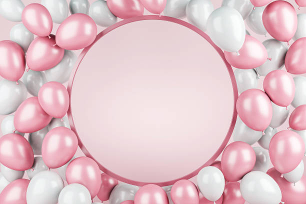 Pink balloon decorations indoors.