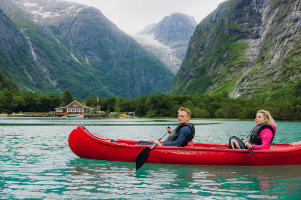 istock Feeling Awe Canoeing on Crystal Blue Lake With Majestic Glacier Landscape 2163246866