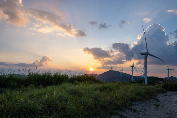 Mountaintop wind turbine in the evening