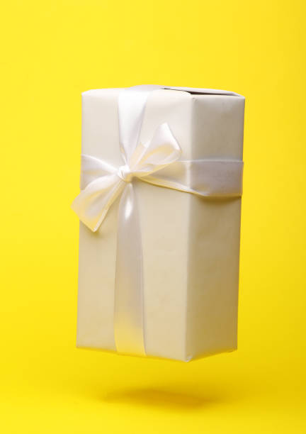 Halloween gift box with orange and purple colors isolated on white background and copy space. 3d render.