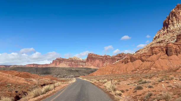 istock Capitol Reef Scenic Drive Road and Cliffs on a Sunny Day, Utah 2163257739