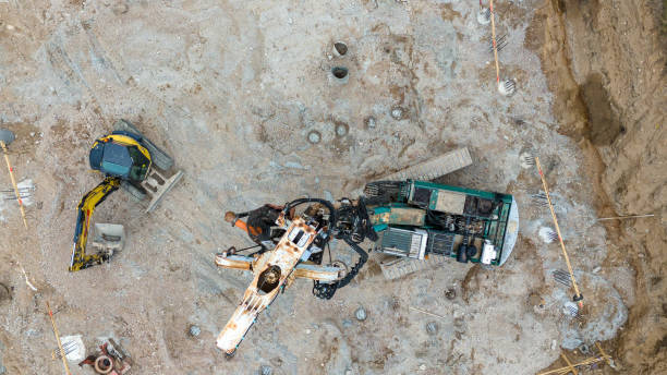 istock Drone photography of construction site , construction material and machinery during summer evening 2163260267