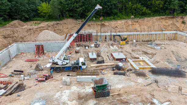 istock Drone photography of construction site , construction material and machinery during summer evening 2163260279