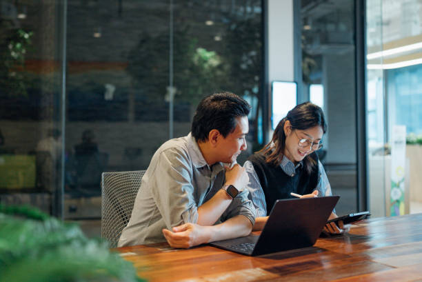 istock Group of business people working together in modern office working space 2163263856