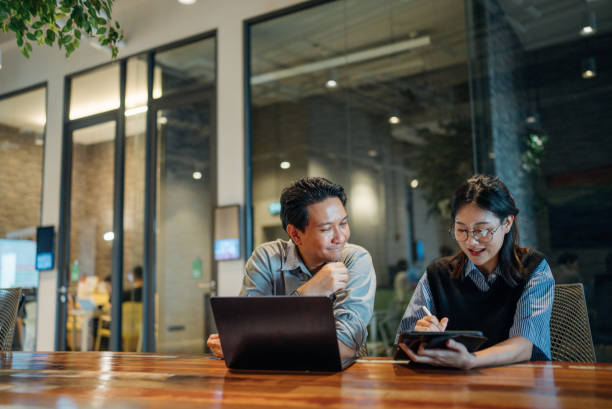 istock Group of business people working together in modern office working space 2163263857