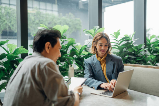 istock Group of business people working together in modern office working space 2163264108