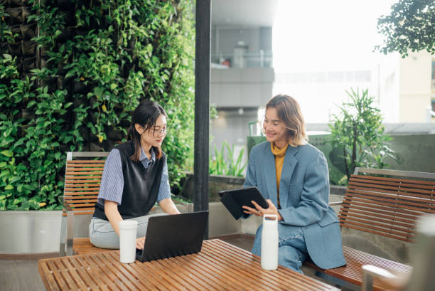 istock Group of business people working together in modern office working space 2163264406