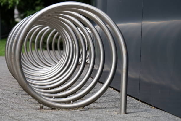 istock Abstract tubular structure of a coiled spiral as a bicycle rack. 2163267426