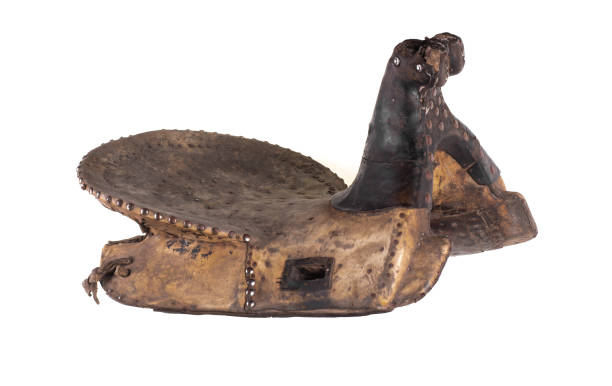 istock old wooden horse saddle isolated on white background 2163269933