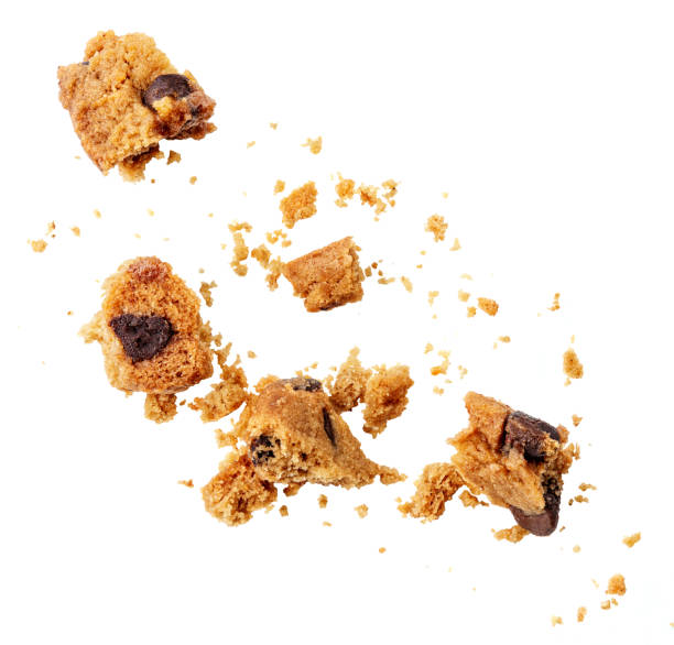istock Explotion of Broken chocolate chip cookies   isolated on white background.. Cookies broken in pieces with crumbs. 2163271792