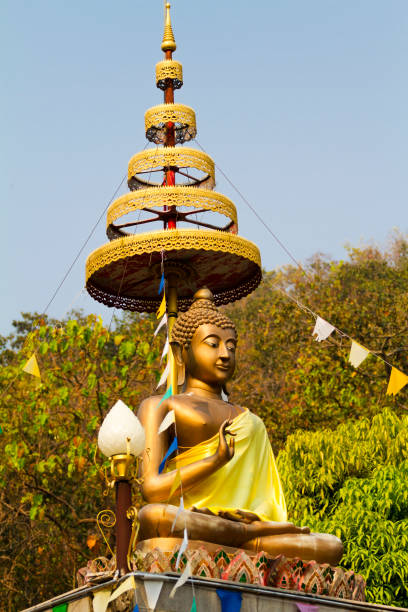 Thai buddha statue in landscape  at Wat Doi Thaen Phra Pha Luang in San Sai  district of Chiang Mai