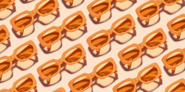 istock Minimal pattern of Stylish sunglasses with Yellow Frame on peach background, sunlight shadow, summer plastic-framed glasses. Aesthetic banner with eyeglasses, linear style fashion eyewear 2163281787