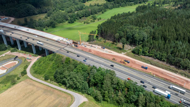 istock Highway bridge under construction - aerial view 2163288198