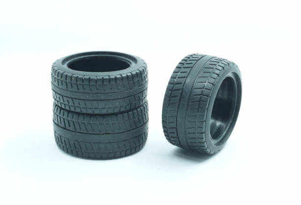 Fully white tires isolated on white background. Selective focus. Concept image.