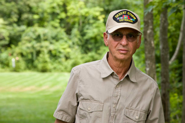 istock Desert Storm veteran outdoors looking at camera 2163304219