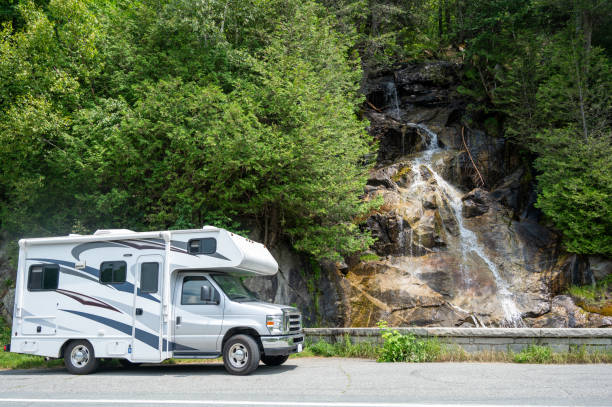 istock Peter Gilman Waterfalls and motorhome 2163308034