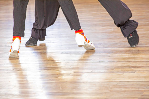 istock girl dancing with teacher dance program standard in ballroom dancing 2163308554