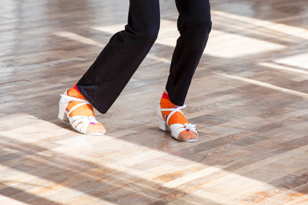 istock girl dancing with teacher dance program standard in ballroom dancing 2163308767