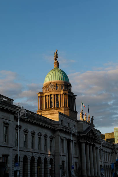 Dublin, Ireland - September 16, 2025: Close up anisometric view of the Church of the Most Holy Trinity and part turret tower, adjacent to the Dublin Castle, showing windows and stone wall construction.