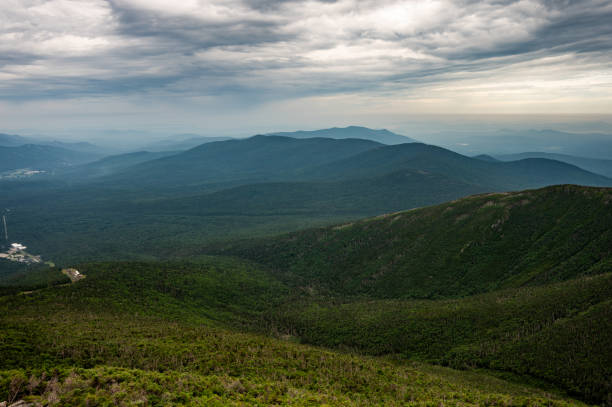Mount Washington surroundings mountains seen from top of mountain during summer day