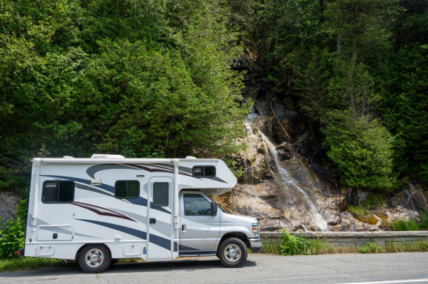 istock Peter Gilman Waterfalls and motorhome 2163310373