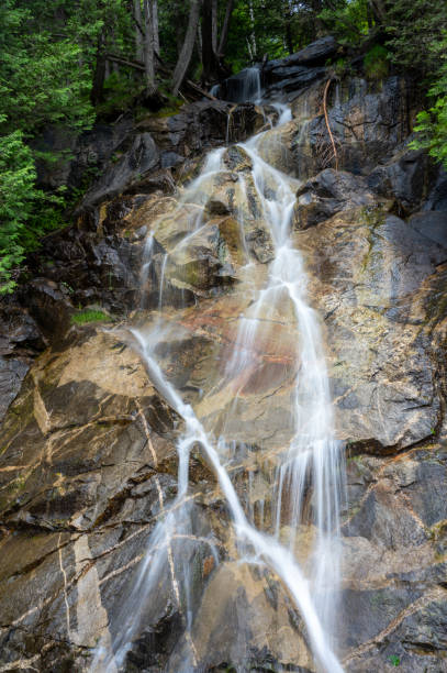 Long exposure of Peter Gilman Waterfalls in Orleans, Barton, Vermont during summer day