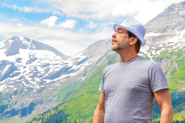 istock An elderly man admires a mountain view in Austria 2163312663