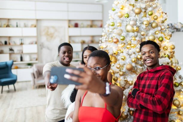 istock Friends celebrating Christmas and making selfie 2163318148