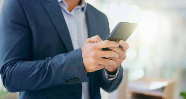 istock Hands, phone and businessman in office typing online email for communication, connectivity or networking. Technology, contact and male lawyer on cellphone with research for legal case in workplace. 2163320745
