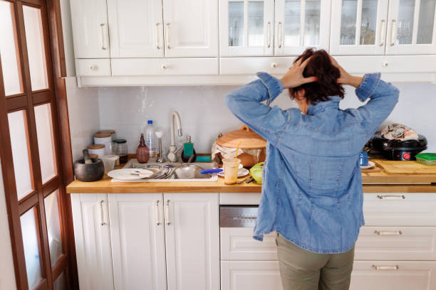 istock Stressed woman standing in the kitchen 2163323851