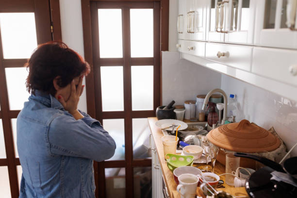 istock Stressed woman standing in the kitchen 2163323883