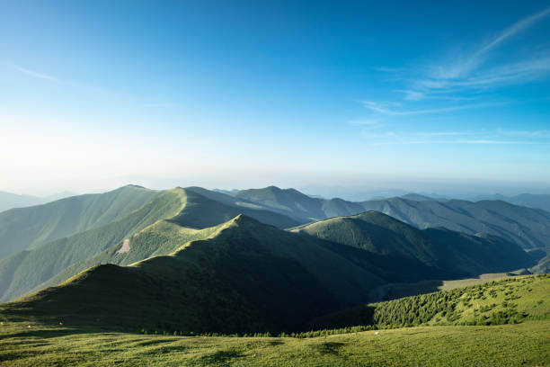 Dramatic view of the fluffy lighting mountains and rocks in Carpathians