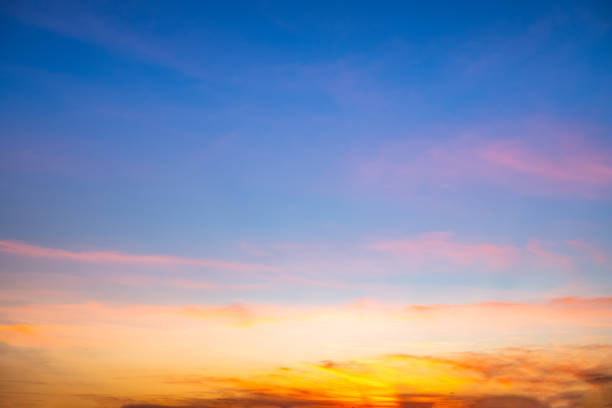 istock Beautiful , luxury soft gradient orange gold clouds and sunlight on the blue sky perfect for the background, take in everning,Twilight, Large size, high definition landscape photo 2163328554