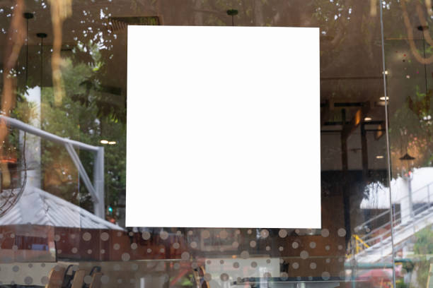 istock White paper poster mockup displayed outside the building restaurant. 2163328763
