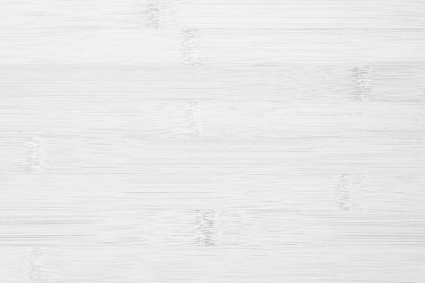 istock White wooden desk texture background, Top view. Abstract top bar table wood bamboo pattern nature. Design wall vintage interior kitchen. Bamboo skin cutting board empty for displaying products. 2163330893