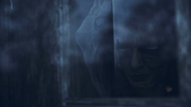 istock Face of demon ghost house windows 2163331028