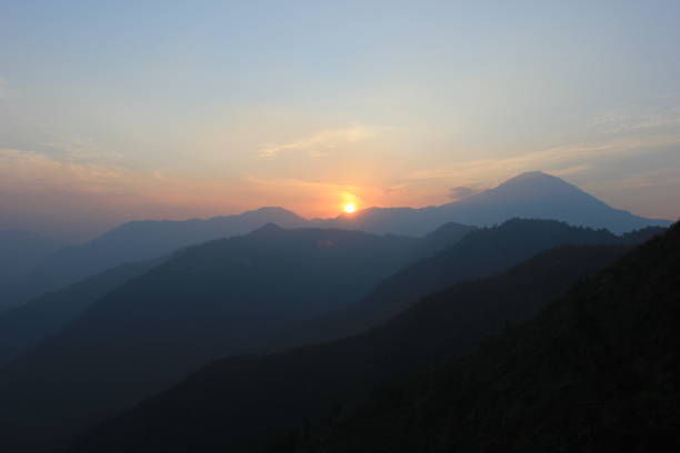 View from Manakamana Temple, Gorkha, Nepal. Taken November 23, 2012. Several layers of hills seem here from the Manakamana temple area along with the evening sunset. The temple sits on a hill just over 100 kilometers from the capital city of Kathmandu. Popular temple in the country where according to legend wishes come true.
