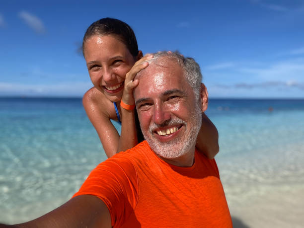 istock Family tropical beach vacation selfie 2163348745