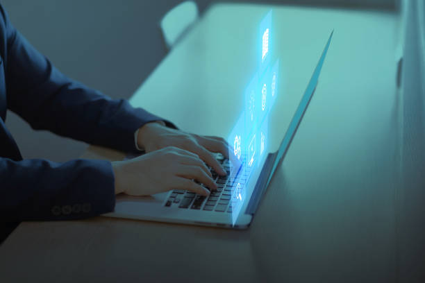 istock E-learning Education. data protection. Businessman uses laptop learning online education training webinar on internet for personal development and professional qualifications.. 2163349379